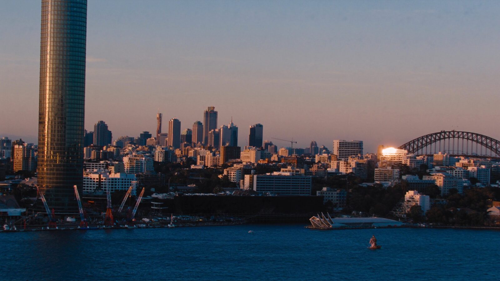 Sydney Harbour and city skyline from the air at golden hour