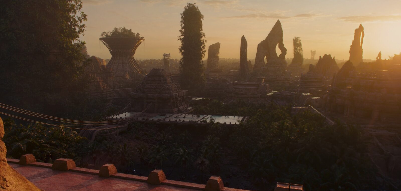 A futuristic tropical city skyline with tall gardens and sculptural towers at dusk